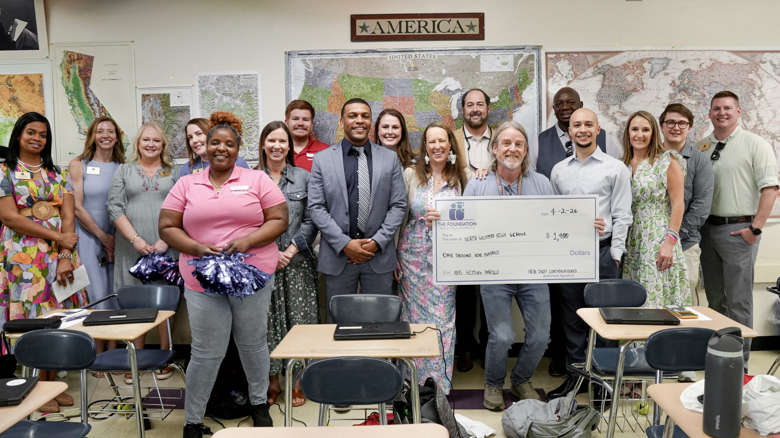 photo of emotional grant presentation